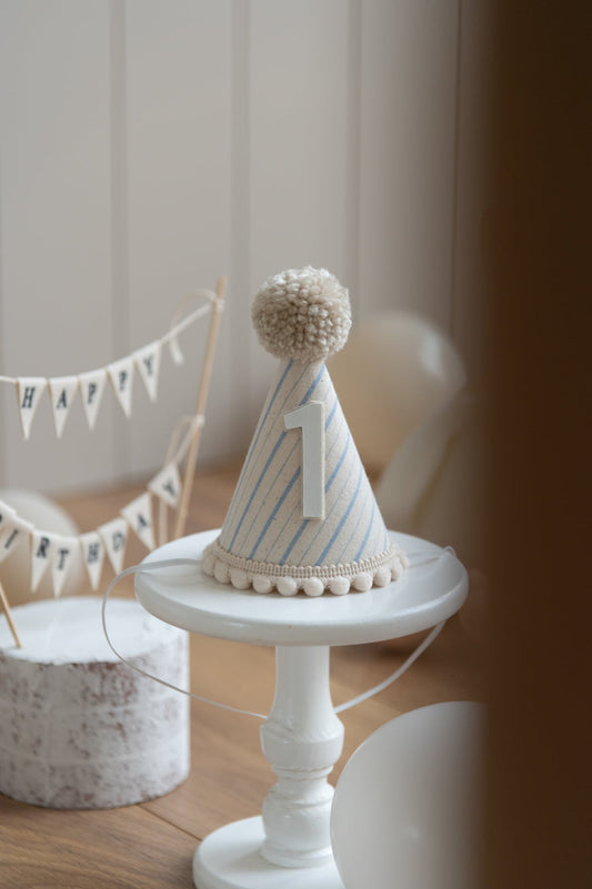 Light beige and blue stripe first birthday hat