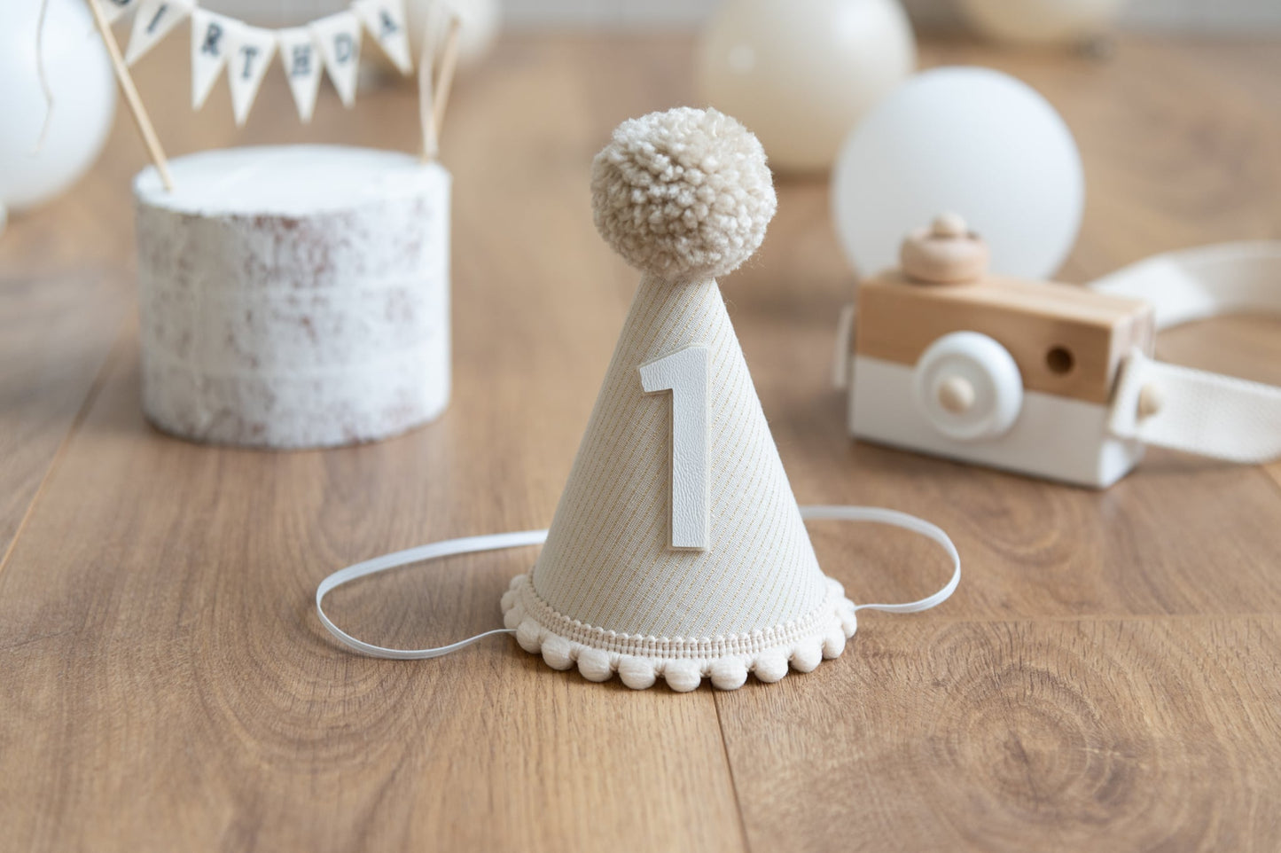 Beige and gold stripe first birthday hat