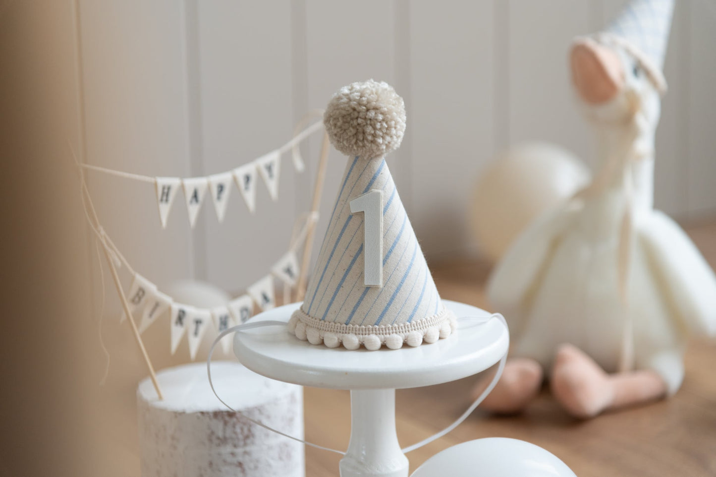 Light beige and blue stripe first birthday hat