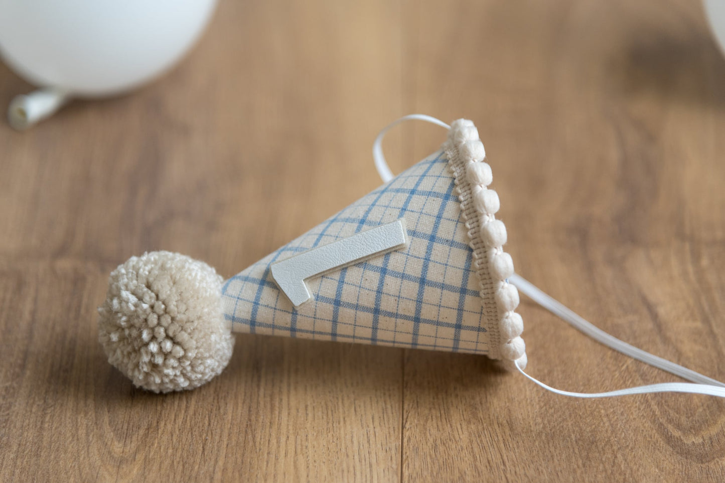 Light beige and blue gingham first birthday hat