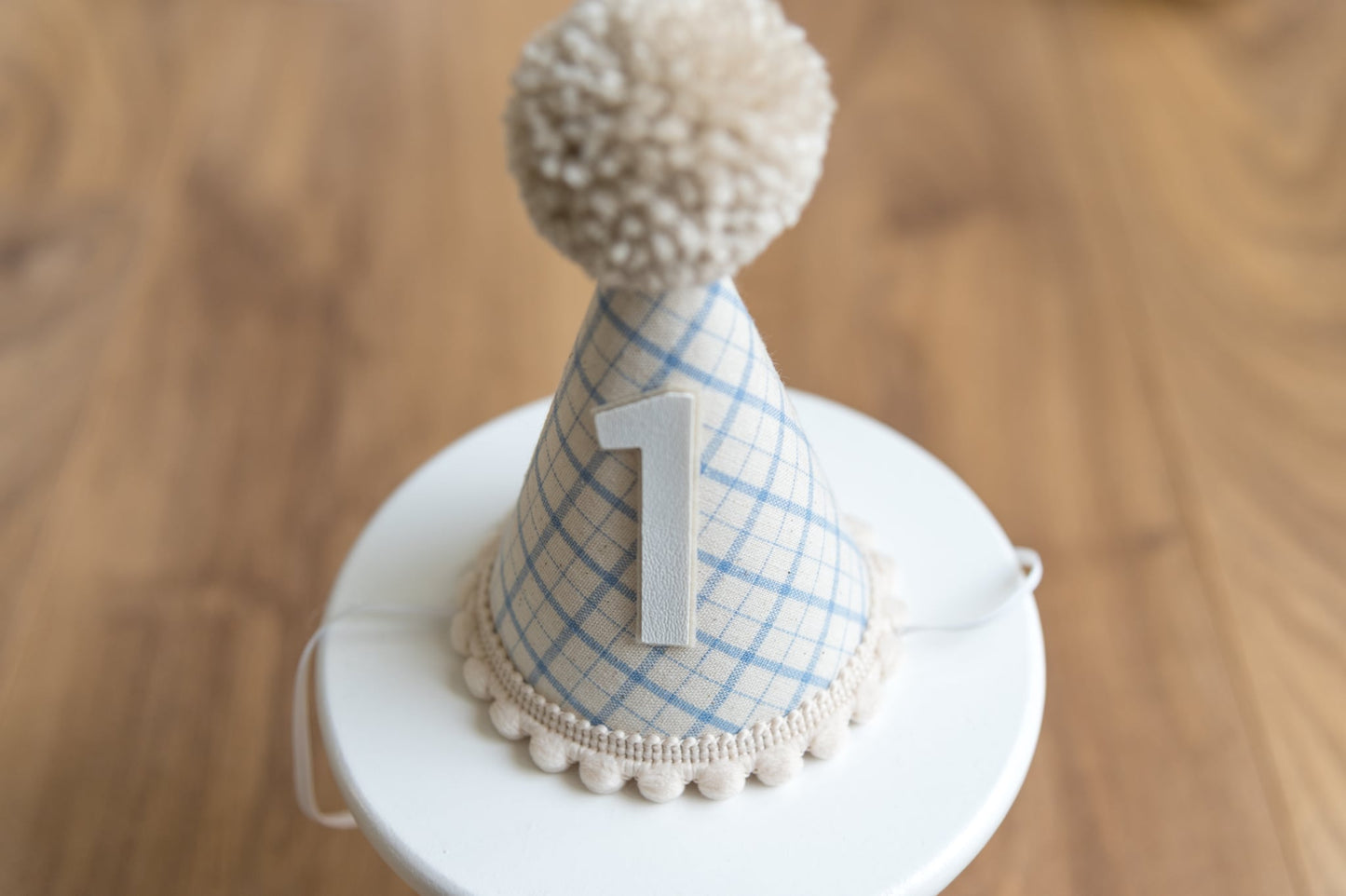 Light beige and blue gingham first birthday hat