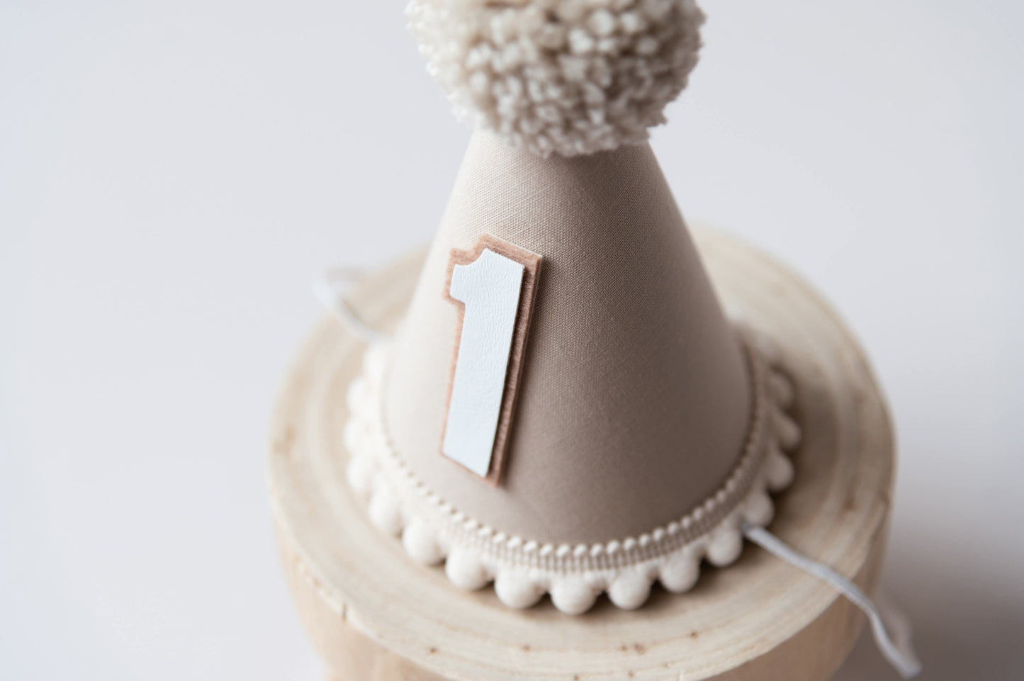 Beige first birthday hat