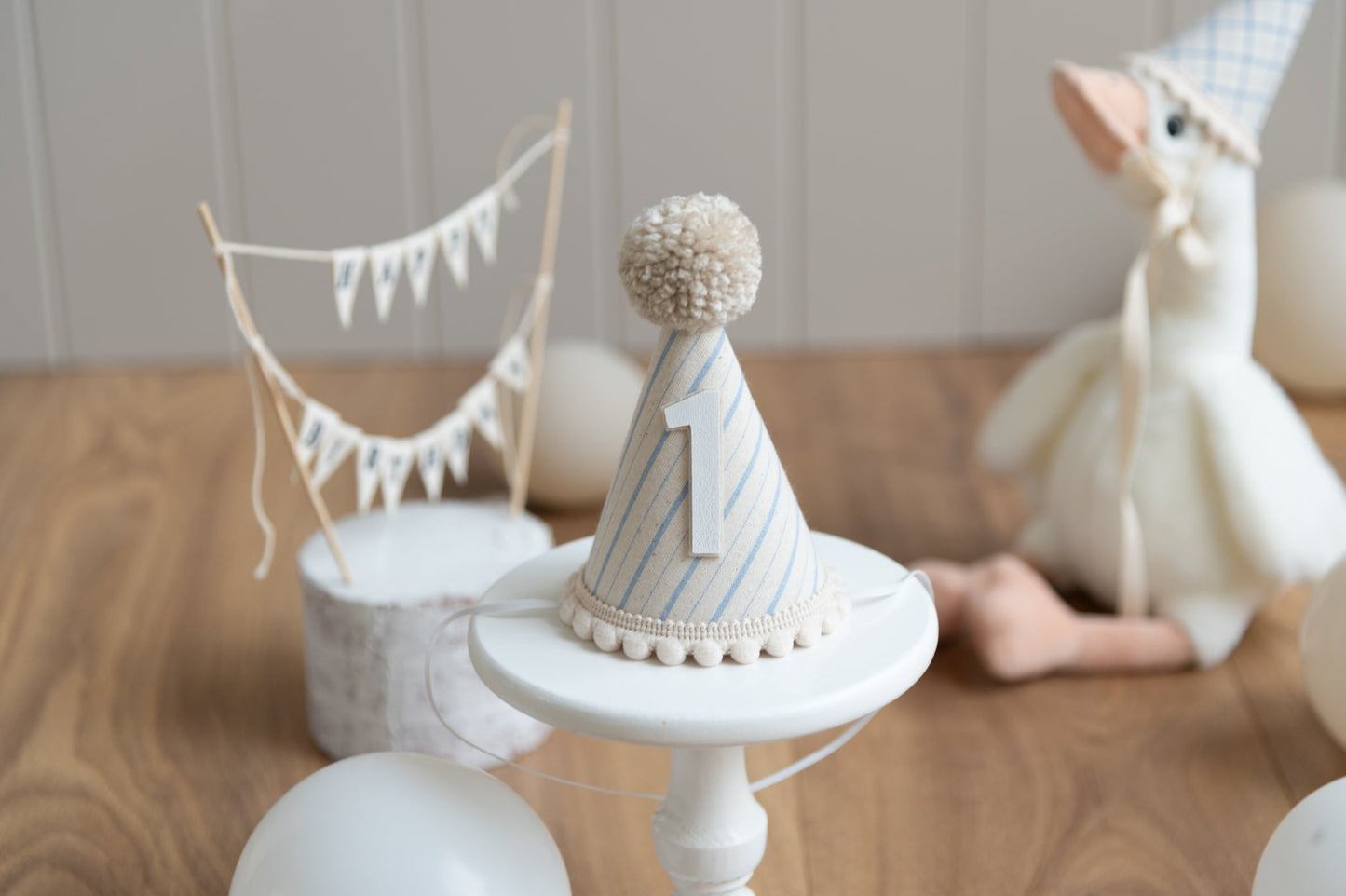 Light beige and blue stripe first birthday hat